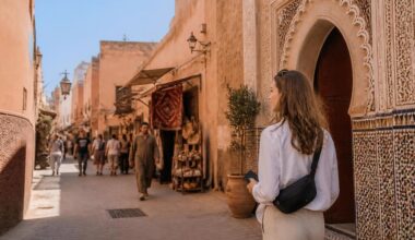International traveler walking confidently through a busy Moroccan medina in daylight