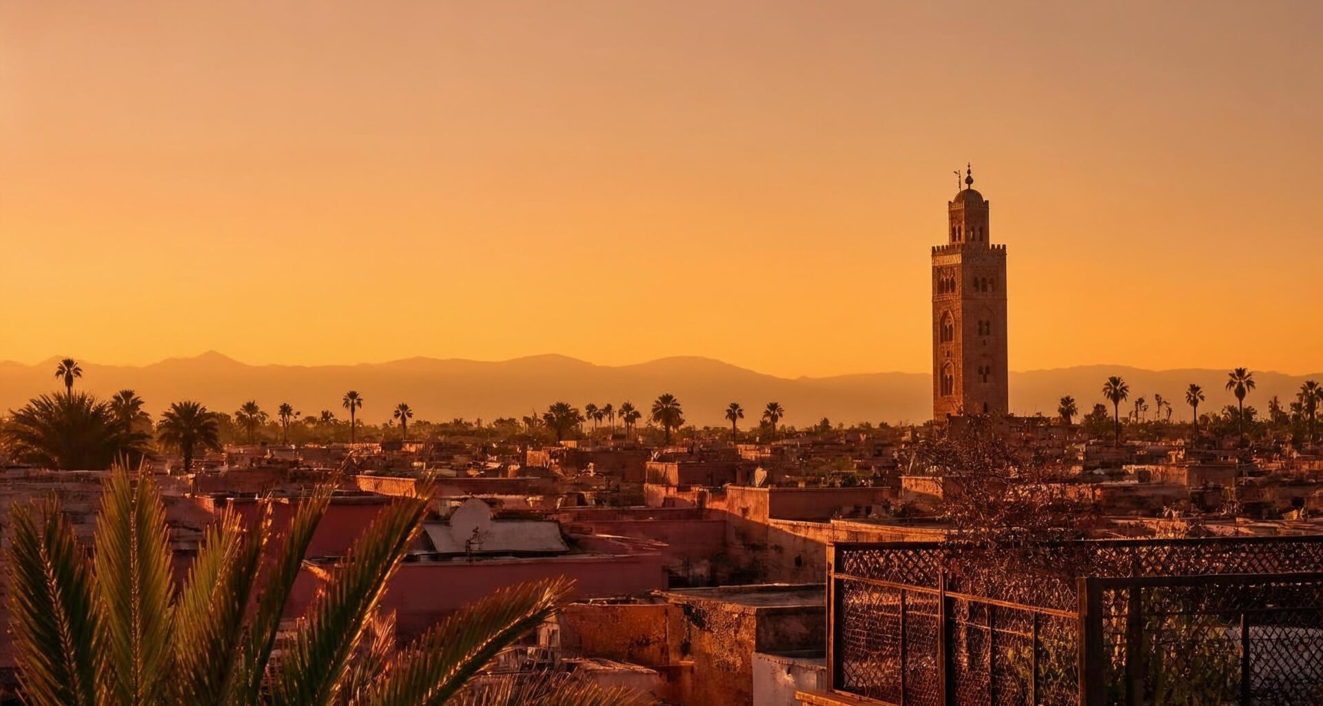 Marrakech medina rooftops and Koutoubia minaret at golden hour