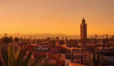 Marrakech medina rooftops and Koutoubia minaret at golden hour