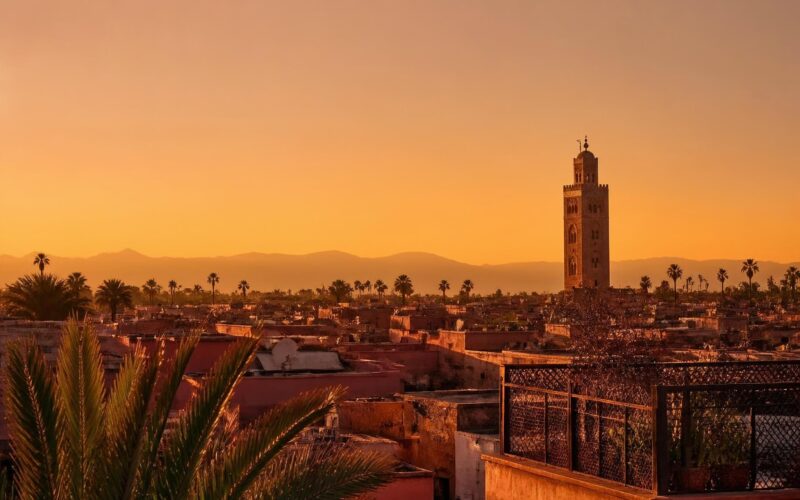 Marrakech medina rooftops and Koutoubia minaret at golden hour