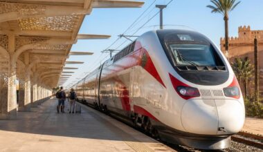 Modern passenger train arriving at a railway station in Morocco